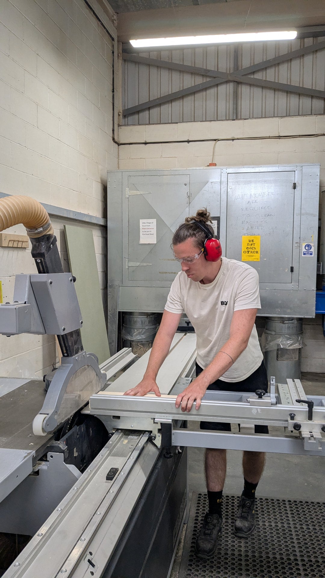 Dan Clutterbuck working at the saw in the studio