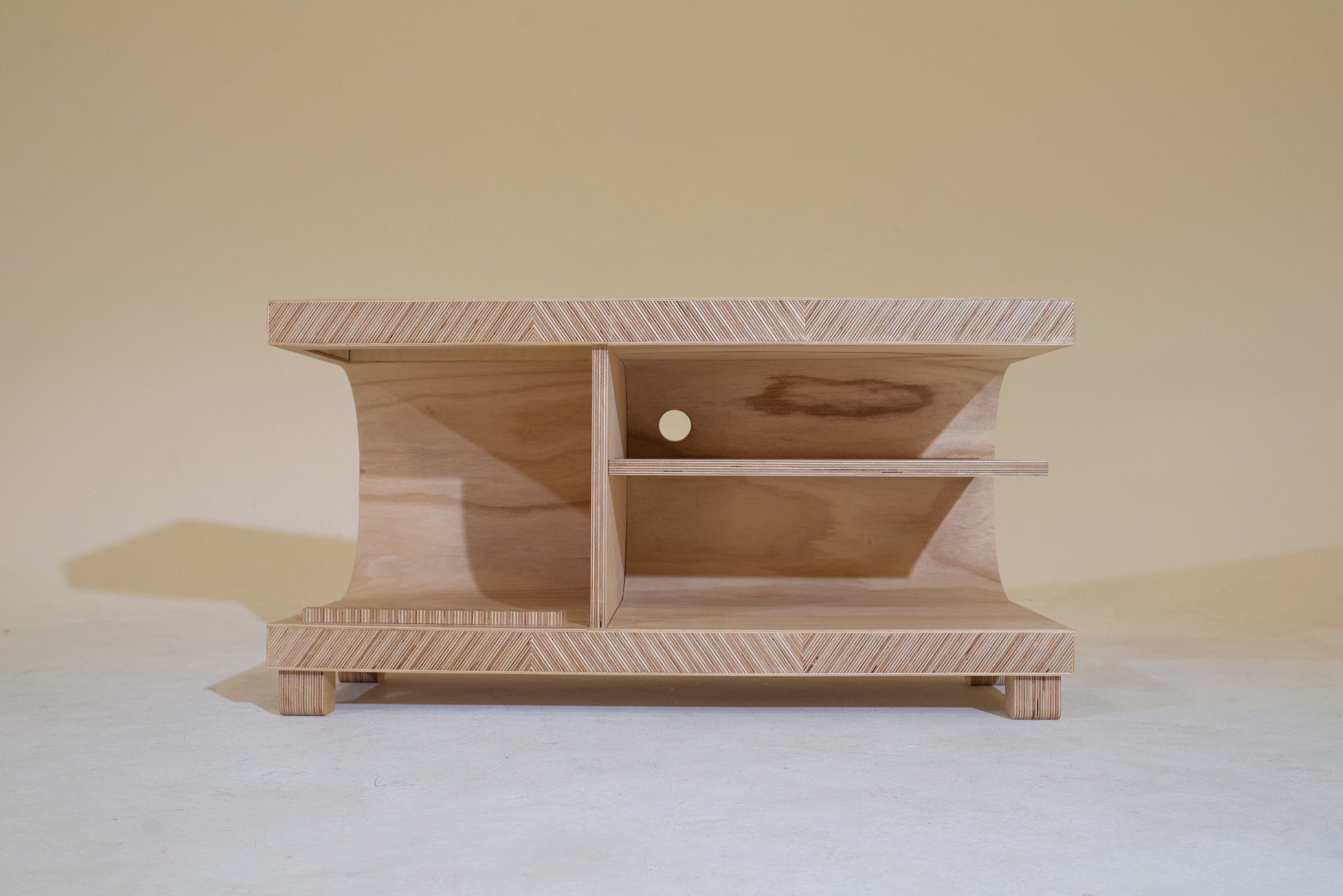 Front elevation of the 33⅓ cabinet showing its two bays, internal shelf and layered plywood edge